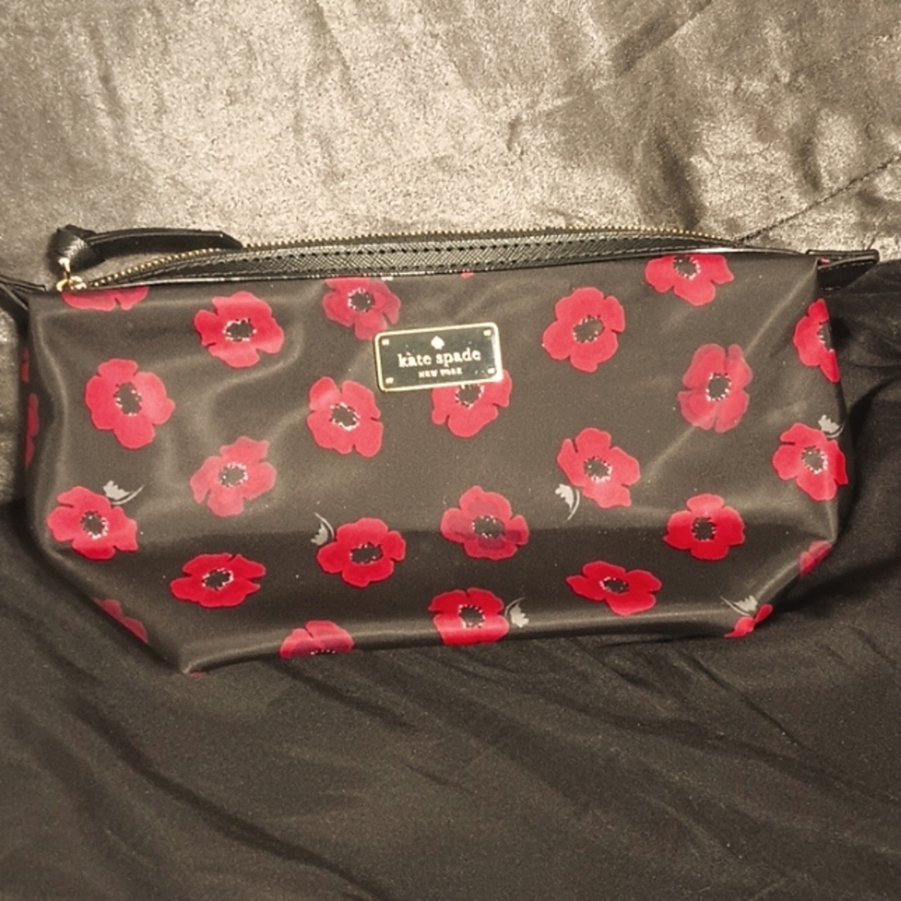Kate Spade makeup bag, medium size. Black with red poppies.